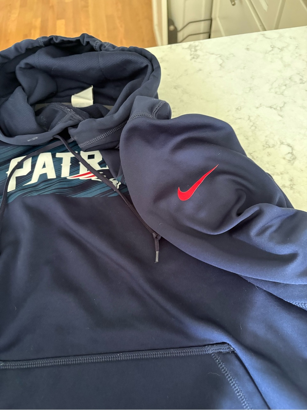 Nike Men’s Navy Hoodie with Red Swoosh